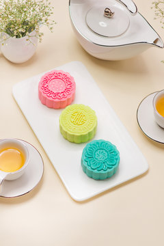 Pastel soft moon cake on white plate