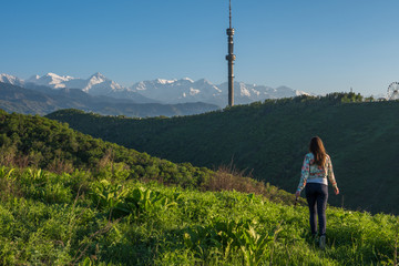 Young woman in the mountains, Almaty, Koktobe