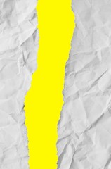 ripped paper on yellow background