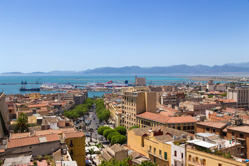 Fototapeta na wymiar Cagliari, Sardinia, Italy. A picturesque view of the city and the port from the side of the fortress