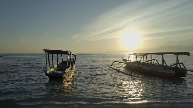 Fishing and Tour Boats Moored in the Early Morning Sunrise