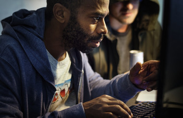 African descent man working with computer laptop