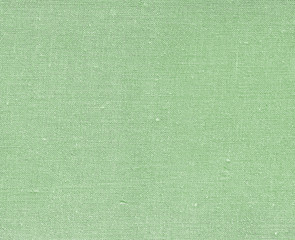 Green colored natural textile texture.