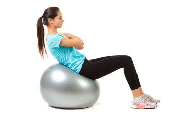 Fitness woman and pilates ball