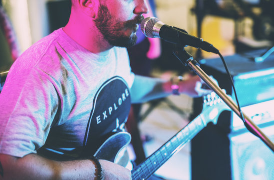 Man playing guitar on leisure event