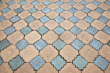 Texture of the old patterned tile pavement.