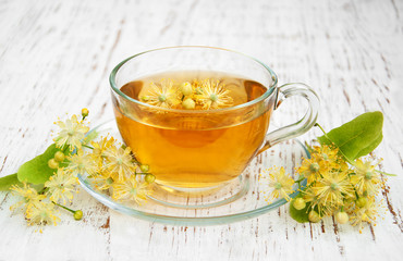 cup of herbal tea with linden flowers