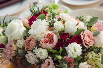 Wedding decor. Flowers in the restaurant, food on the table