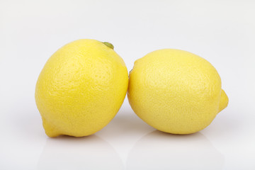 Fresh lemon on white background