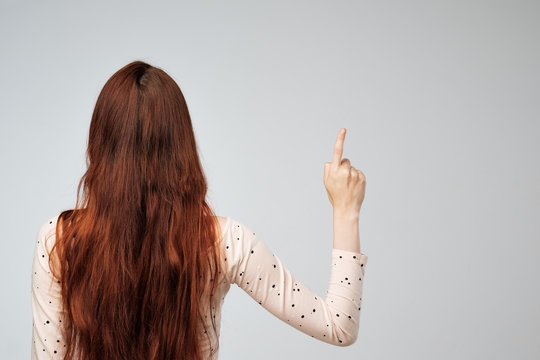 Copyspace With Caucasian Woman With Long Red Hair From The Back