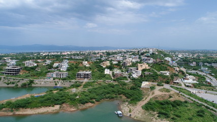 view of over population and greenery and cloudy  sky