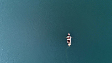 Ariel drone view of a fishing ship in water