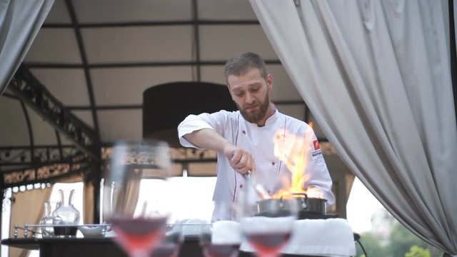 The chef prepares the Foie gras for the guests