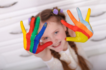 Girl hands paint