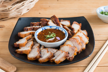 Deep Fried Crispy Pork Belly Cooked with Garlic and spicy dipping sauce