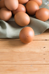 Organic eggs on wood. Fresh eggs.