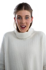 Portrait of surprised woman wearing sweater