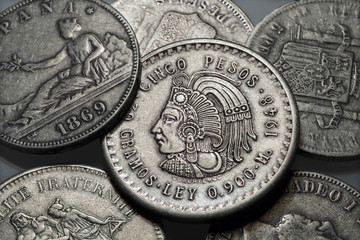 Old historically silver Coins from around the World in the Detail