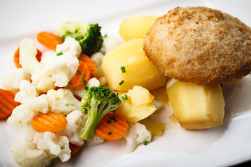 Chicken Kiev with vegetables