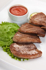 dishes of roast meat