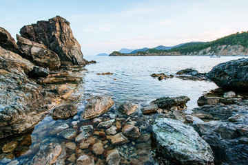 Fototapeta na wymiar Huge rocks, cliffs and rocks along the coast.