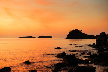 Fototapeta na wymiar orange sunset over the sea