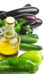 vegetables and a bottle of oil isolated