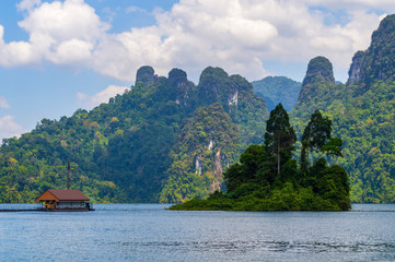 Fototapeta na wymiar Beautiful mountains lake river sky and natural attractions in Ratchaprapha Dam at Khao Sok National Park, Surat Thani Province, Thailand