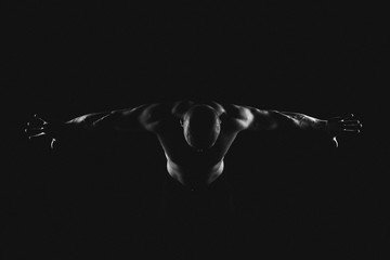 bodybuilder on black background