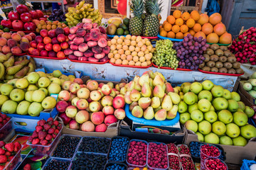 Fruit market with various colorful fresh fruits. Fresh fruits.  Fruits  at a farmers market