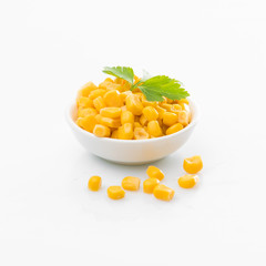 Canned corn  in a bowl. sweet corn. corn isolated on white background