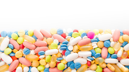 Fototapeta na wymiar pills border. Multicoloured medical pills