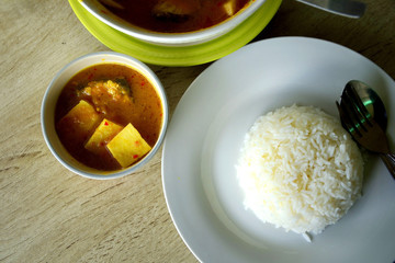 Thai meal with rice and sour soup