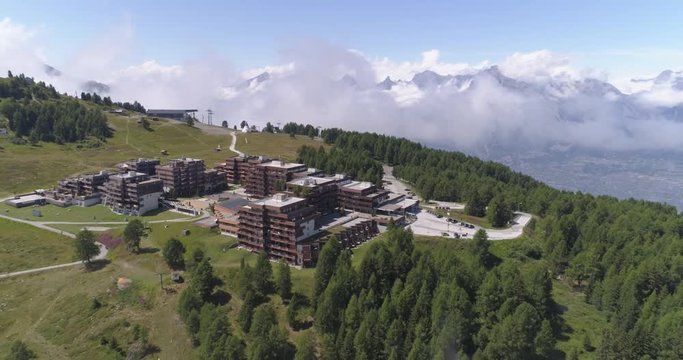 Thyon back traveling in clouds - Aerial 4K - Phantom 4 PRO