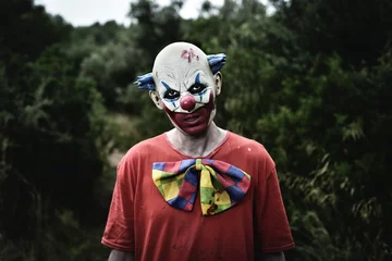 Fototapete Rund gruseliger böser Clown im Wald © nito