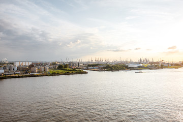 Fototapeta na wymiar Top view on Elbe river with huge port of Hamburg city in Germany
