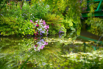Beautiful Claude Monet's Garden of Giverny, lilies pond - obrazy, fototapety, plakaty