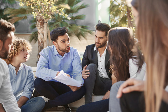 Businessman arguing with coworker on meeting