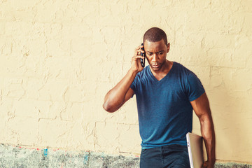 Young Black Man Calling outside