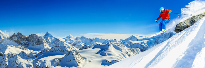 Skiing with amazing view of swiss famous mountains in beautiful winter snow  Mt Fort. The...