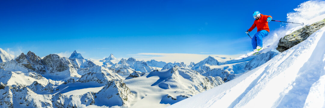 Skiing with amazing view of swiss famous mountains in beautiful winter snow  Mt Fort. The matterhorn and the Dent d'Herens. In the foreground the Grand Desert glacier.