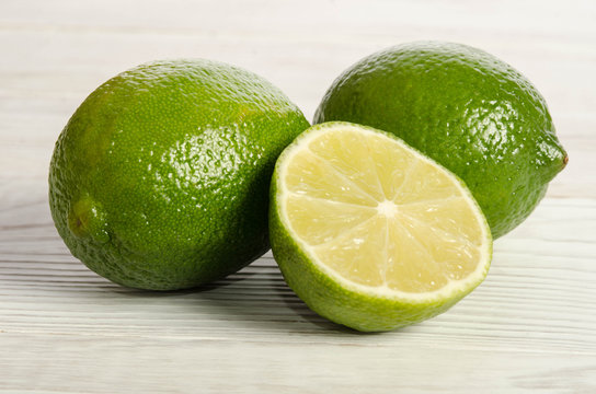 two juicy lemons on a wooden table