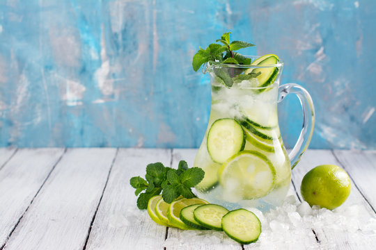 Infused water with cucumber, lime and mint on