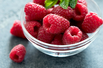 Fresh raspberries, healthy berries, close up, vegan concept, food background