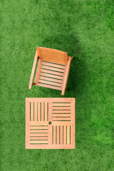 top view wood table and chair table on grass