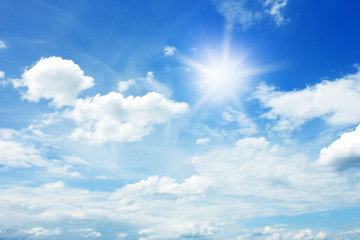 sun and clouds in the blue sky background