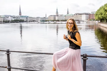 Young woman tourist enjoying great view on the old city centre of Hamburg, Germany © rh2010