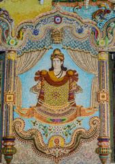 Fototapeta na wymiar Traditional Thai style sculptures and painting in church under decoration of Wat Pariwas in Bangkok, Thailand.