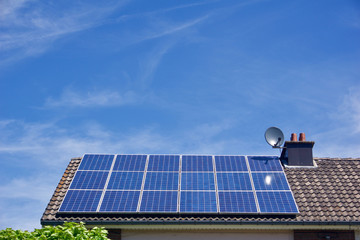 Photovoltaic panels on the roof of a residential building