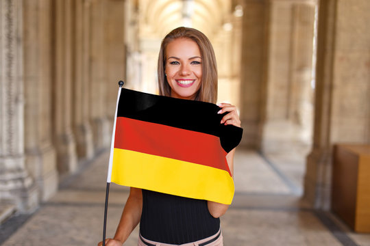 Young woman smile with flag of Germany